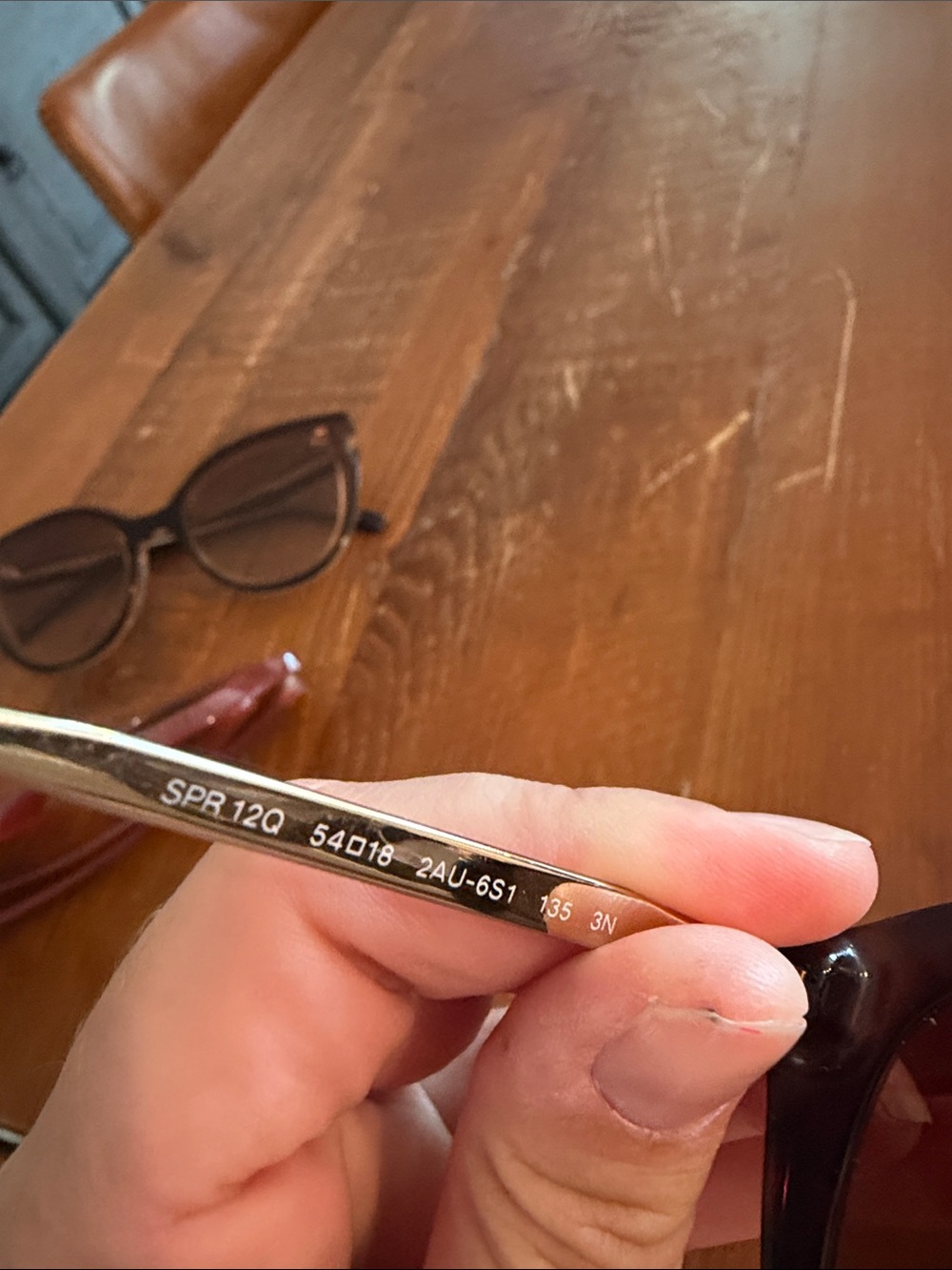 Prada Women’s Tortoiseshell Frame Sunglasses with Gold Arms and Brown Lenses - Picture 3 of 3
